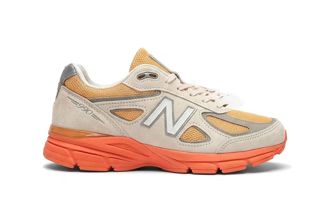 New Balance 990v4 “Moonbeam/Tangerine Heat” llega con detalles cítricos para el verano 2026